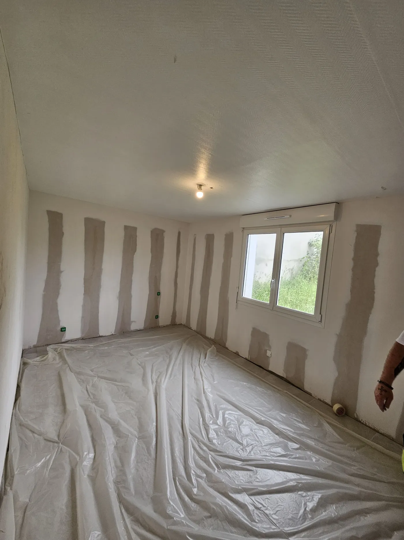 Protection des sols et préparation des murs